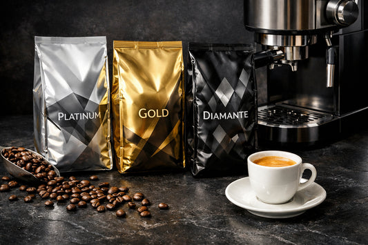 Café Delta na Holanda — an elegant arrangement of Platinum, Gold, and Diamante coffee bean packages next to an espresso cup.