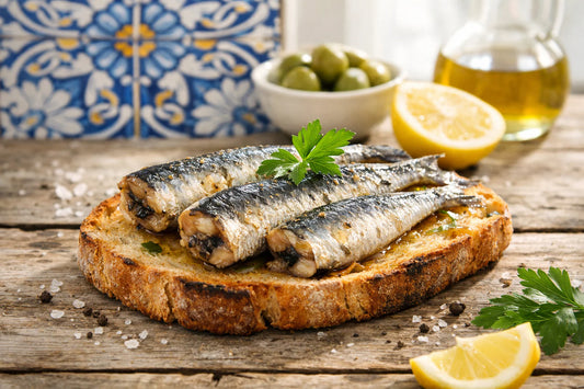 Ramirez Sardines — Plump Portuguese sardines served on a slice of rustic toast with fresh parsley.