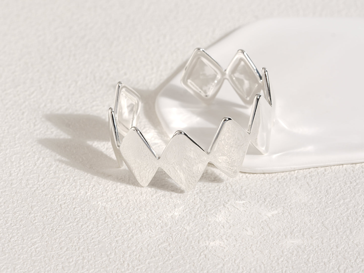 Edgy Silver Bracelet designed by Rebeca Sá