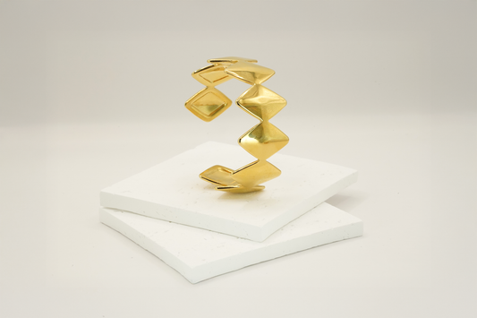 Edgy Gold Bracelet designed by Rebeca Sá