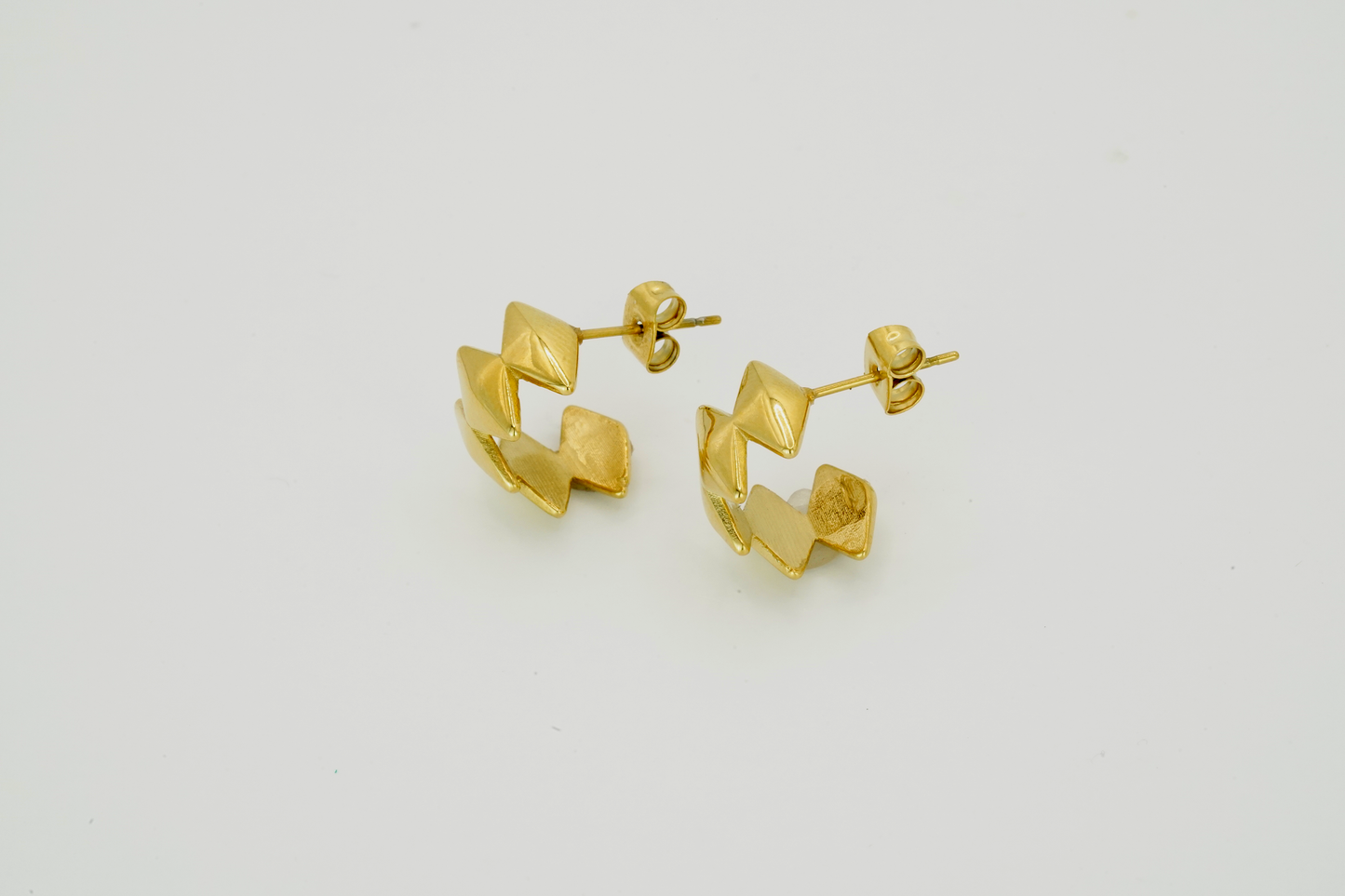 Edgy Earrings, designed by Rebeca Sá