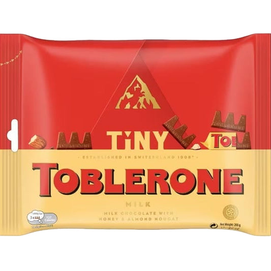 Toblerone Tiny 200g package with 25 mini triangular Swiss chocolate pieces with honey and almond nougat - Desapega.nl